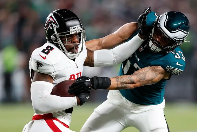 Eagles linebacker Zack Baun gets shoved by Atlanta Falcons tight end Kyle Pitts on Monday, September 16, 2024 in Philadelphia.