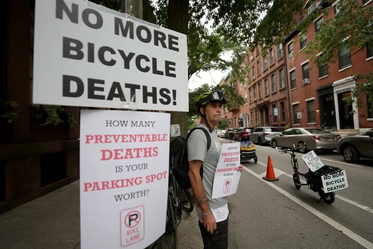 Robert Tomas, of Southwest Philadelphia, protests outside the Tenth Presbyterian Church in Philadelphia, on Sunday, Aug. 4, 2024.