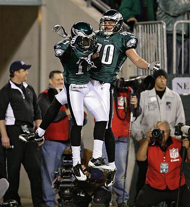 Philadelphia Eagles Kevin Curtis celebrates his touchdown on a 61-yard pass  in the first half of the football game with the Detroit Lions Sunday, Sept.  23, 2007, in Philadelphia. The Eagles are