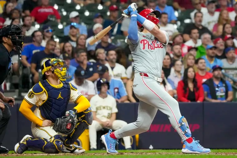 Bryce Harper hits a two-run homer for the Phillies during the sixth inning Tuesday against the Brewers.