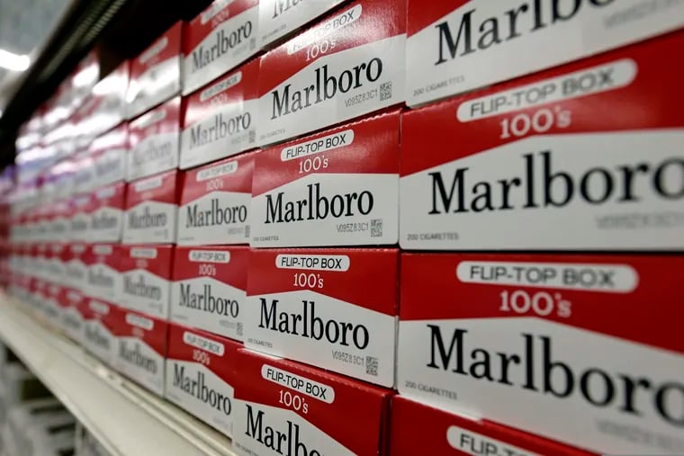 Cartons of Marlboro cigarettes on the shelves at JR Cigar Outlet in Burlington, N.C. Sen. Dick Durbin (D., Ill.) and other congressional Democrats introduced legislation to establish the first federal e-cigarette tax and increase the tobacco tax rate.