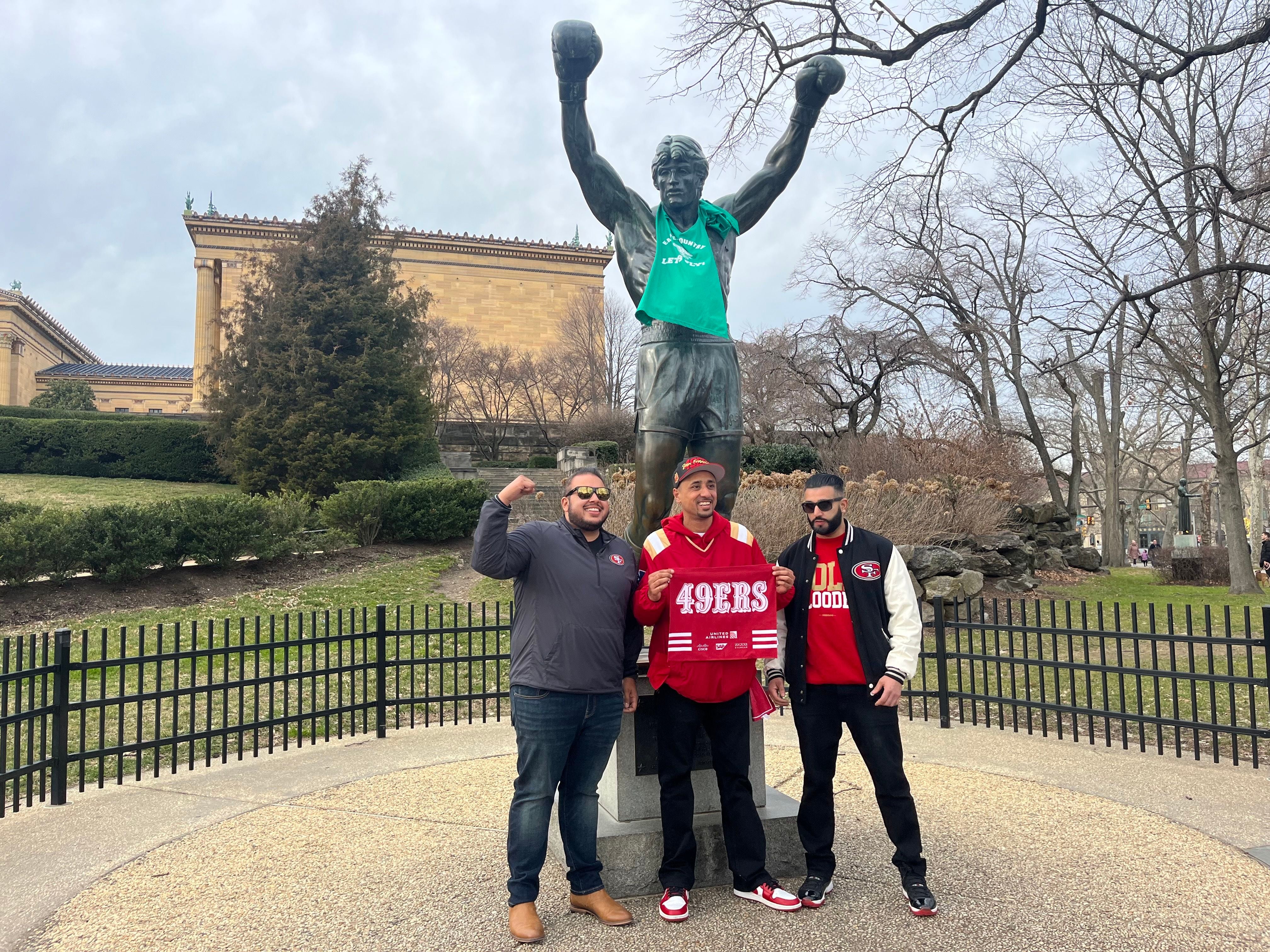 49ers fans takeover the Rocky statue in Philly 