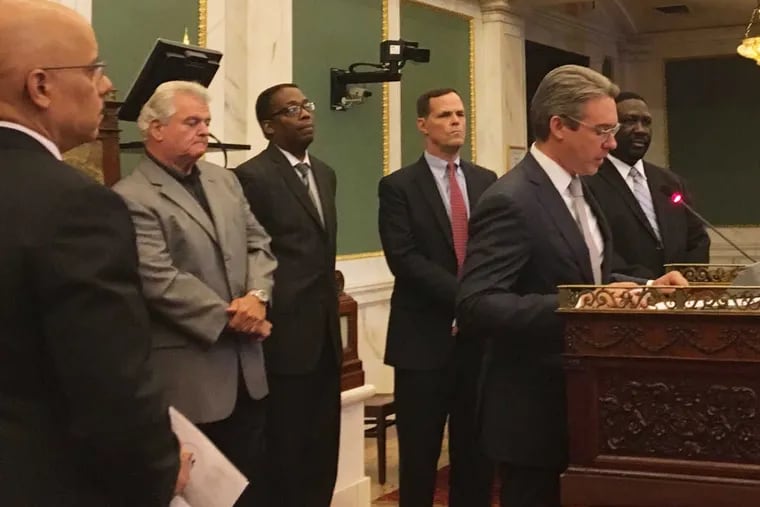 Al Schmidt, a Republican and vice chairman of the City Commissioners, joins with (from left) state Sen. Vincent Hughes, U.S. Rep. Bob Brady, City Council President Darrell Clarke, Committee of 70 CEO David Thornburgh and City Commissioner Chairman Anthony Clark to discuss the Nov. 8 election.