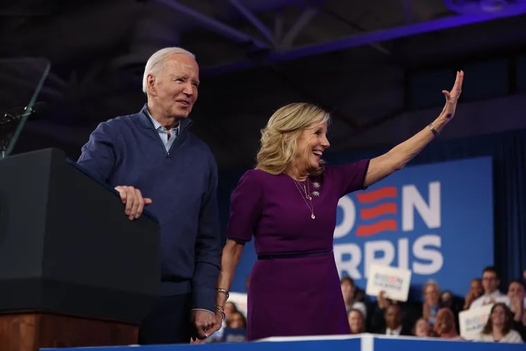 President Joe Biden and first lady Jill Biden wave at the crowd as they make their way out at Strath Haven Middle School in Wallingford on Friday, March 8, 2024.