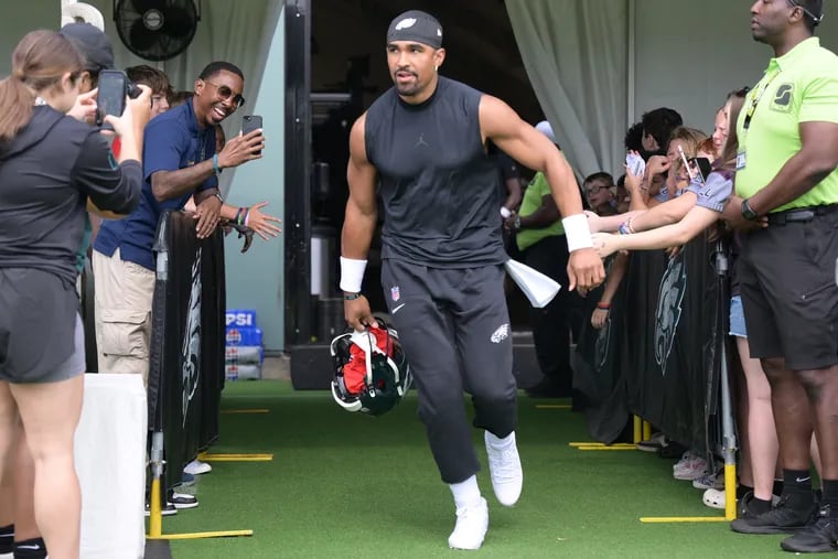 Jalen Hurts entering the field on July 29 during a training camp session at the NovaCare Complex.