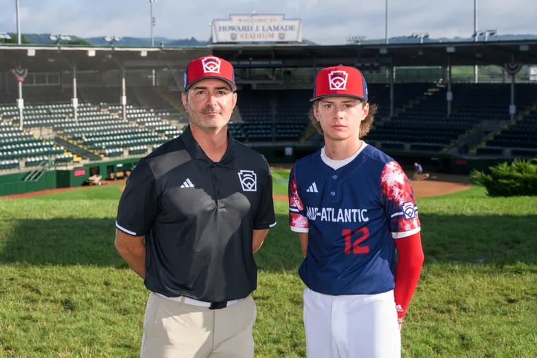 Media Little League coach Scott Crowley and his son Austin pose for a photo at Howard J Lamade Stadium in Williamsport.