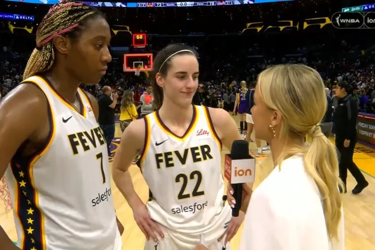 ION WNBA sideline reporter Nikki Kay interviews Caitlin Clark (center) and Aliyah Boston (left) after the Indiana Fever's game vs. the Los Angeles Sparks in May. The network began broadcasting WNBA doubleheaders last year.