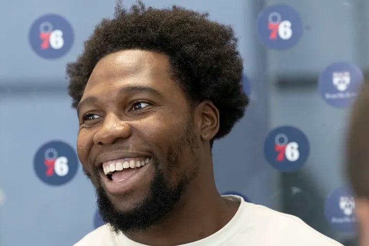 Guerschon Yabusele shares a laugh as he talks to the media on Friday, Aug 30, 2024 during an introductory press conference at the Penn Medicine Philadelphia 76ers Training Complex in Camden, N.J.