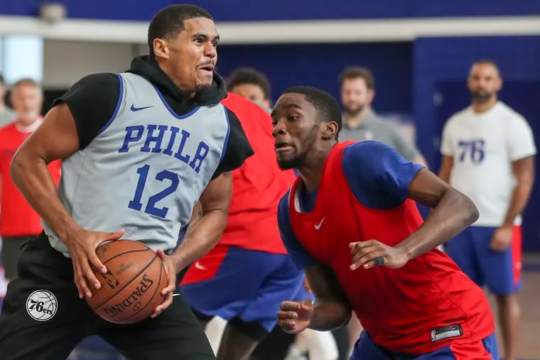 Tobias Harris drives to the basket during a scrimmage at practice at the 76ers training complex in Camden.