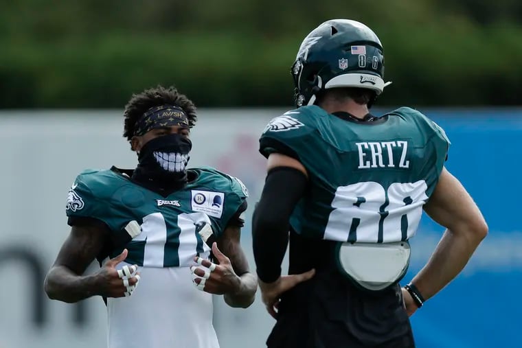 Eagles wide receiver DeSean Jackson (left) talks to teammate Zach Ertz during a recent training camp practice.