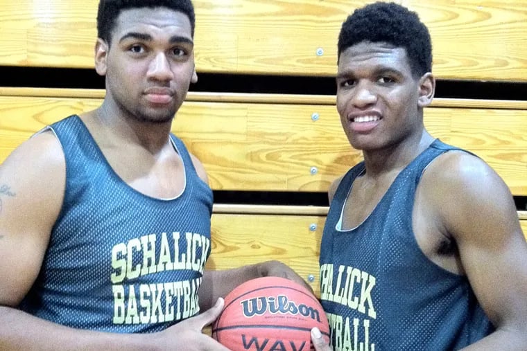 Brothers Rashaan (left) and Mike Holloway of the Schalick boys' basketball team. (PHIL ANASTASIA / Staff)