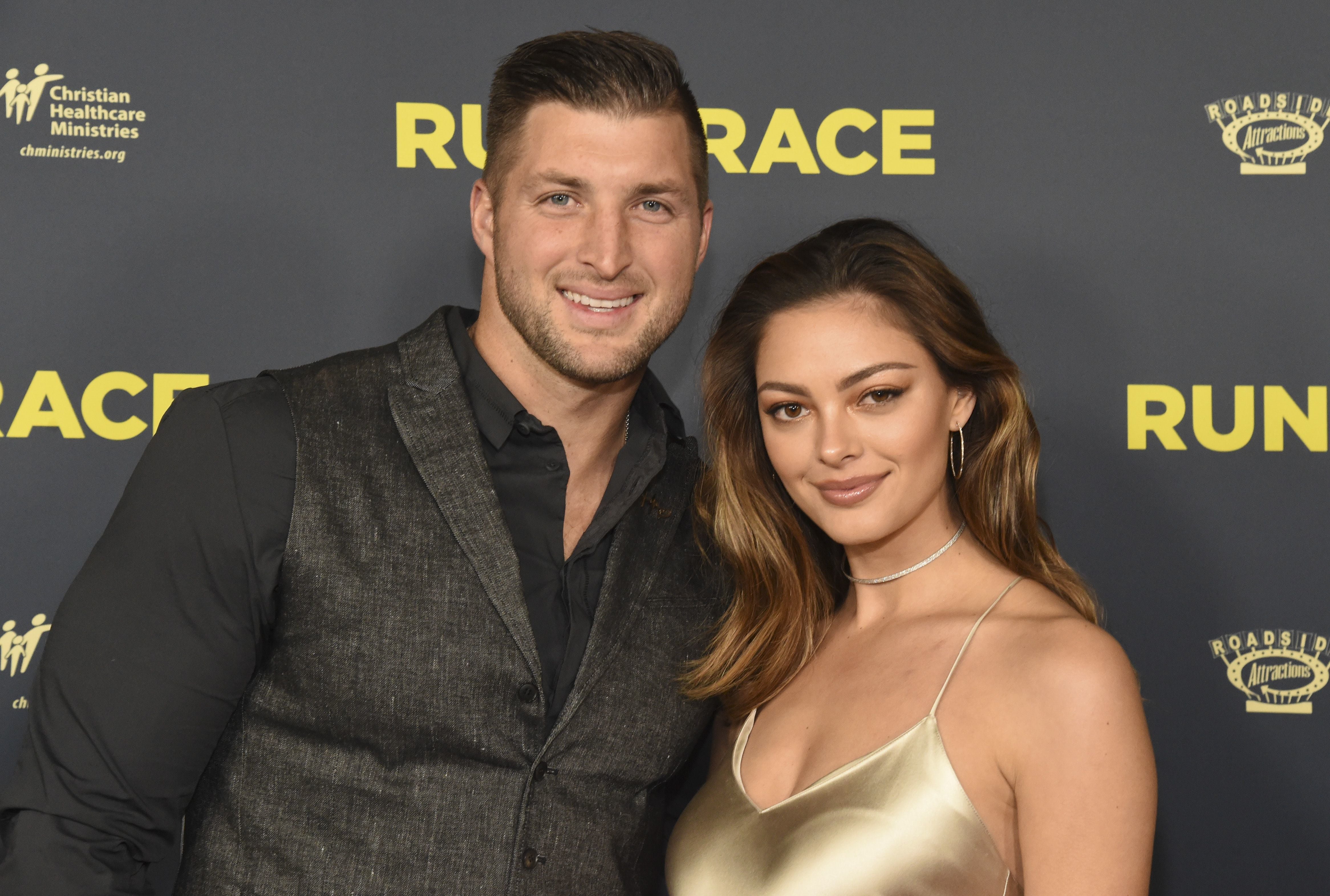 Tim Tebow's beauty queen wife does her best impression of QB's