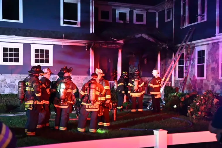 Firefighters battle a house fire on Jobel Drive in Haddonfield, just before midnight on Tuesday night.