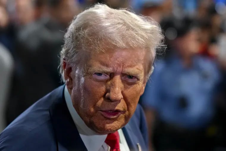 Former President Donald Trump talks with the media in the spin room at the Convention Center following his debate with Vice President Kamala Harris in Philadelphia. Tuesday, Sept. 10, 2024.