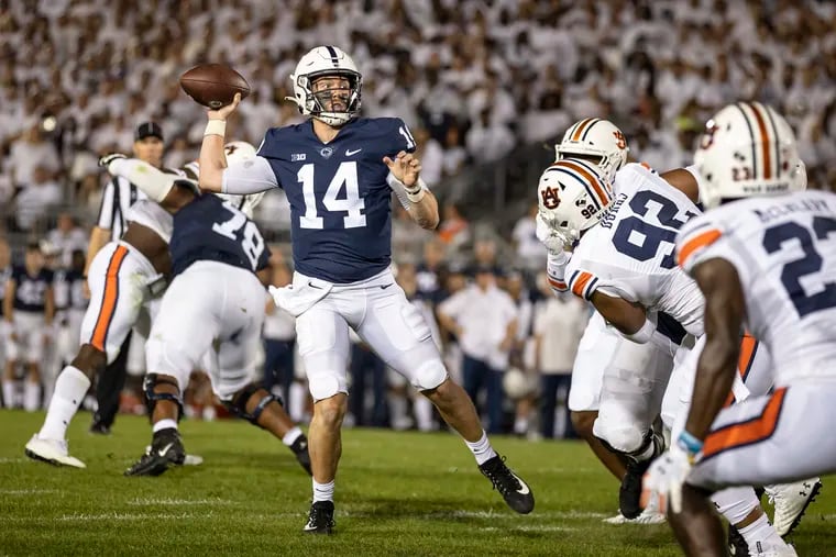 Action Network Use Only - Penn State quarterback Sean Clifford (14) throws a touchdown pass to Jahan Dotson, not pictured, in the first half against Auburn at Beaver Stadium on Saturday, Sept. 18, 2021, in State College, Pa. (Scott Taetsch/Getty Images/TNS)