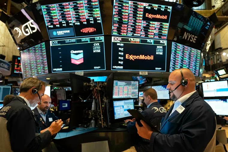 Traders work at the New York Stock Exchange on July 5, 2019 in New York. Boenning & Scattergood, a West Conshohocken securities, asset management and investment banking firm, named a new head of equity research last week.