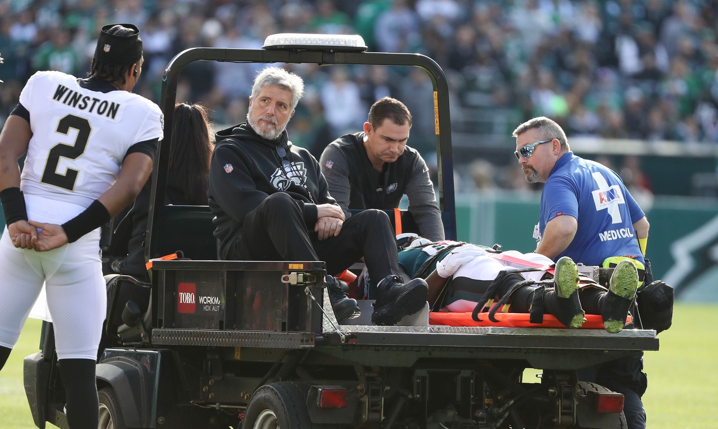 Two Eagles players stretchered off field after neck injuries during game