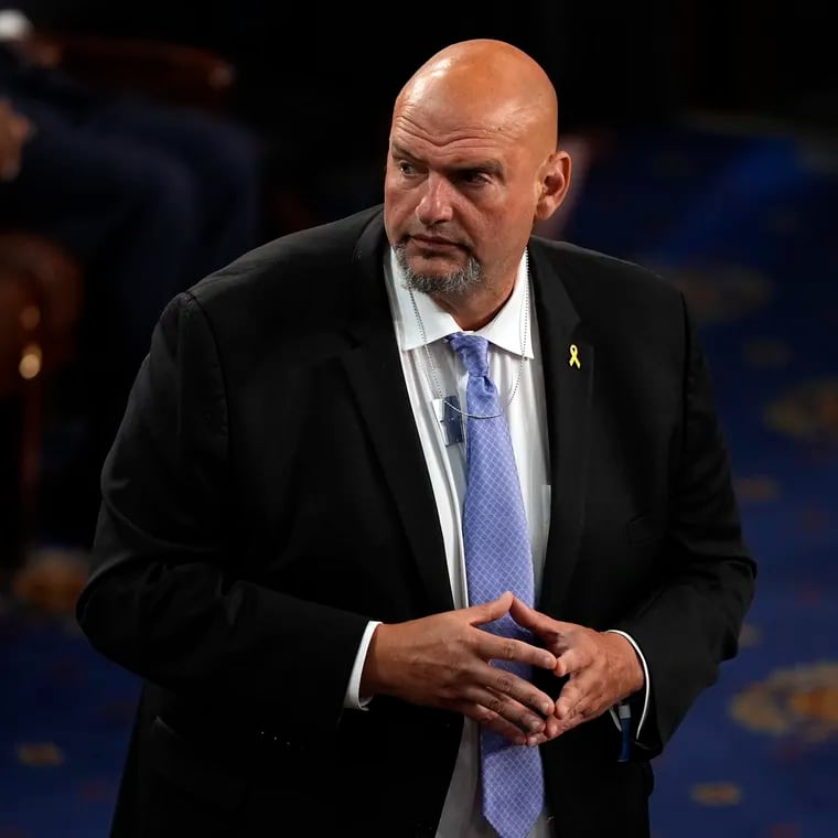 Sen. John Fetterman (D., Pa.) wears a pendant in support of freeing hostages being held by Hamas, before Israeli Prime Minister Benjamin Netanyahu speaks to a joint meeting of Congress at the Capitol on Wednesday.