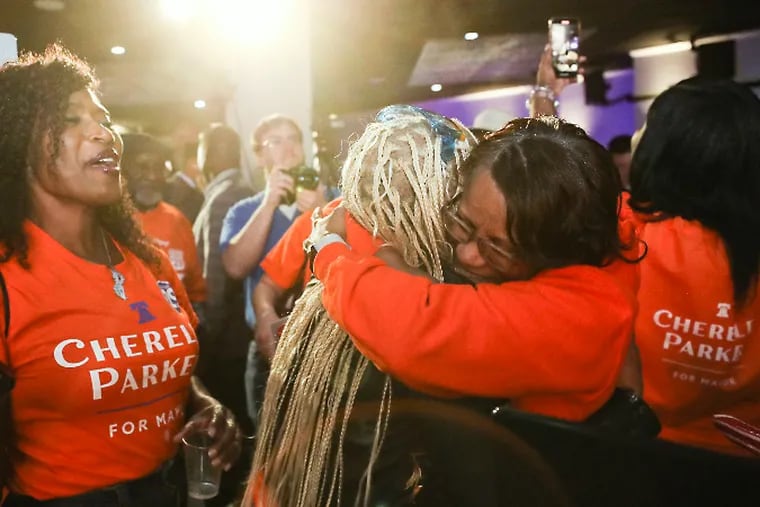 Supporters of Democratic candidate for mayor Cherelle Parker hug as early results come in at Parker’s watch party at Laborers 332 in Philadelphia on Tuesday, May 16, 2023.