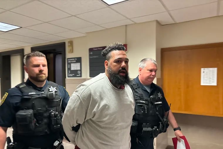 Matthew Santiago is escorted into a courtroom in the Montgomery County Courthouse on Thursday. Santiago was sentenced to two to five years in state prison for, prosecutors say, buying drugs that later killed his girlfriend's 6-year-old son.