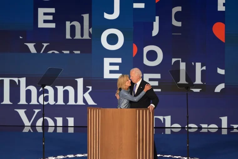 President Joe Biden kisses first lady Jill Biden after speaking at the Democratic National Convention.