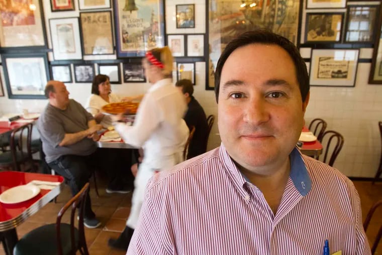 Pennsylvania gaming regulators say Mike Giammarino is unsuitable to operate a restaurant in a casino because of alleged links to organized crime. Giammarino,  shown here in 2013 in Gennaro's Tomato Pie in South Philadelphia, is fighting back.
