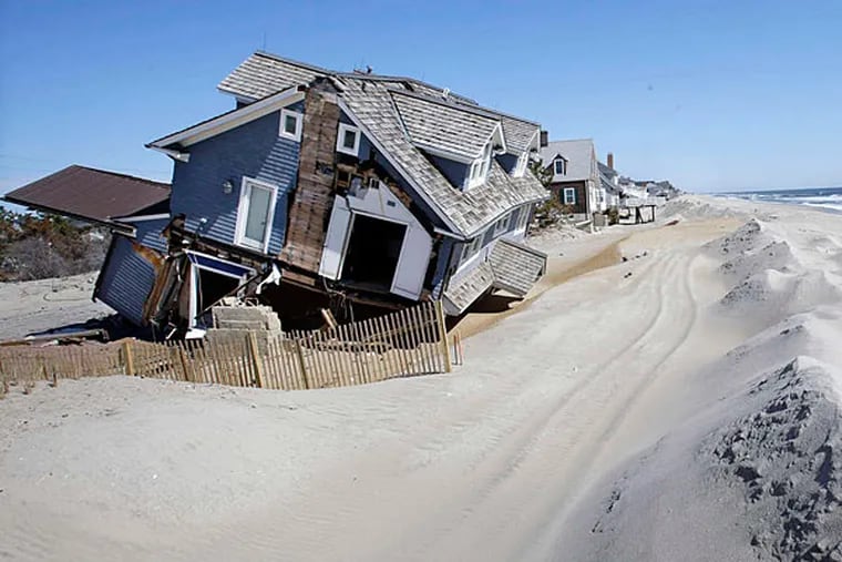 A house in Mantoloking, N.J., severely damaged by Hurricane Sandy. Each of the town's 521 houses was destroyed or damaged in the storm. MEL EVANS / AP