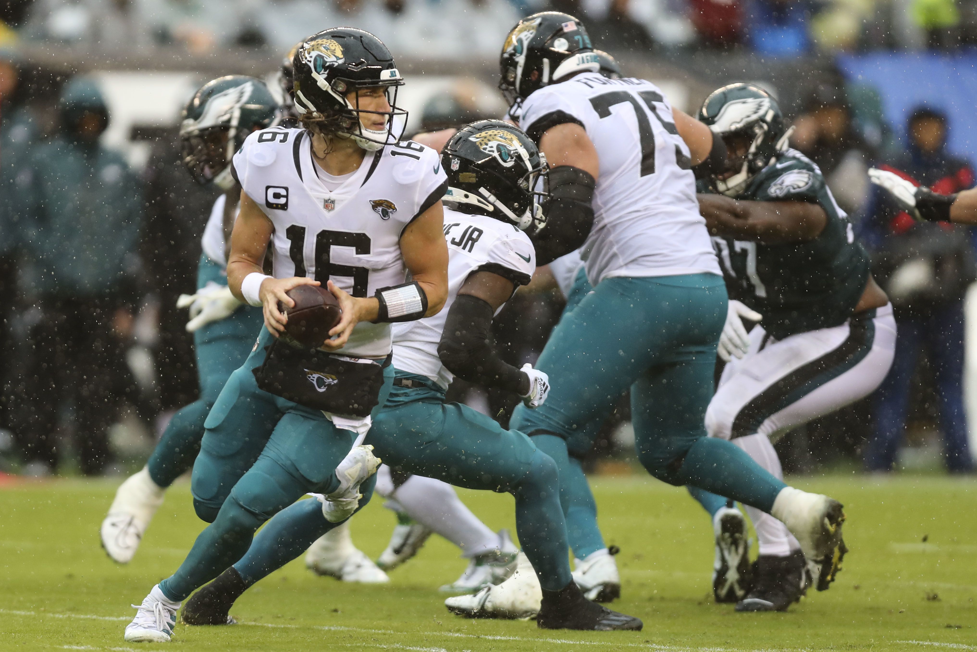 Eagles pound Jags on the ground in dreary conditions, rally from 14-0 hole  as Trevor Lawrence loses 4 fumbles