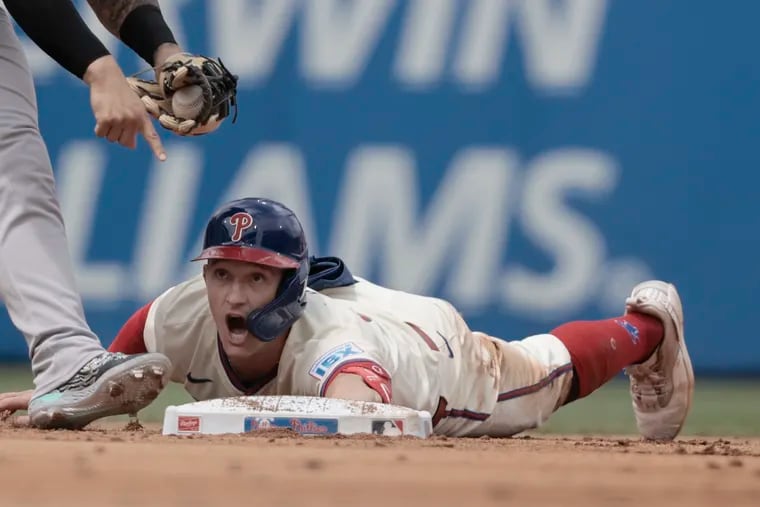 The Phillies' Austin Hays slides into second base with a double against the Yankees on Wednesday.