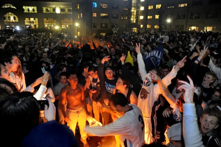 Students start fires on the Quad following Villanova's dramatic win over North Carolina in the NCAA Championship.