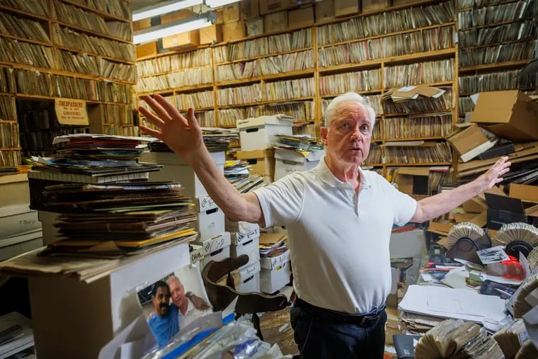 Val Shively of Val Shively R&B Records, 49 Garrett Rd., in Upper Darby, is surrounded in this July photo by a small portion of the more than 4 million records, mainly 45s, he has collected for sale.