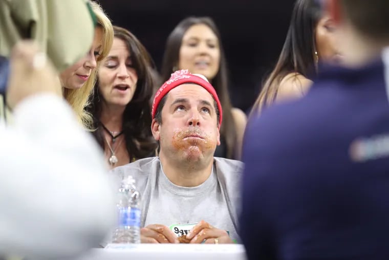 Eaters compete during the second round of Wing Bowl 25 at the Wells Fargo Center in 2017.