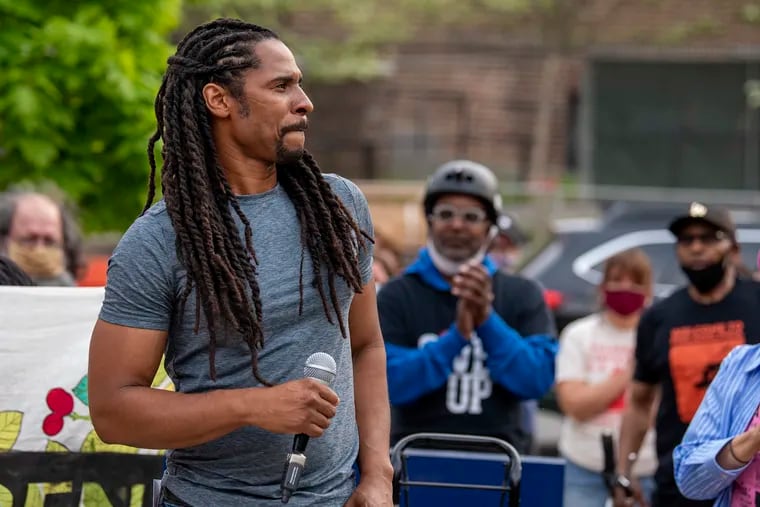 Family member Mike Africa, Jr. speaks during a protest April 28, 2021 in front of the Penn Museum over its handling of human remains from the MOVE bombing.