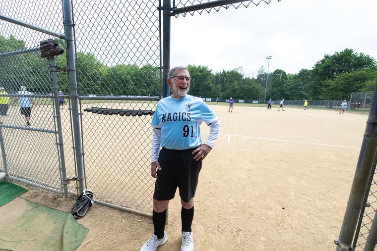 Manny London looks on during a softball game Monday at School Road Park in Hatfield. London is 91 and still playing in the Montgomery County Senior Softball League.