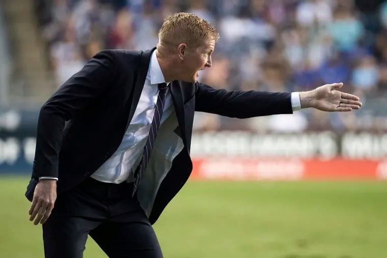 Philadelphia Union coach Jim Curtin reacts during the first half of the team's MLS soccer match against the Seattle Sounders, Saturday, May 18, 2019, in Chester, Pa. (AP Photo/Chris Szagola)