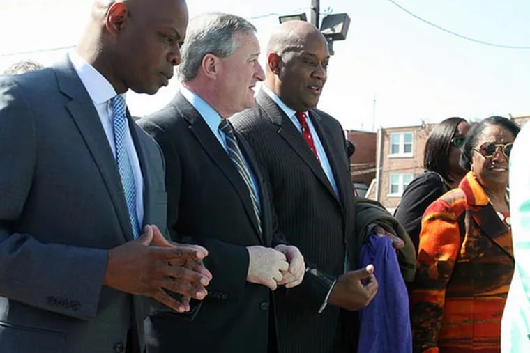 Touring Northwest Philadelphia are (from left) State Rep. Stephen Kinsey, James F. Kenney, State Rep. Dwight Evans, and Councilwoman Marian B. Tasco.