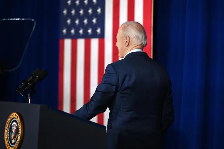 President Joe Biden stands by a lectern on stage following a campaign appearance at the Scranton Cultural Center in April 2024.