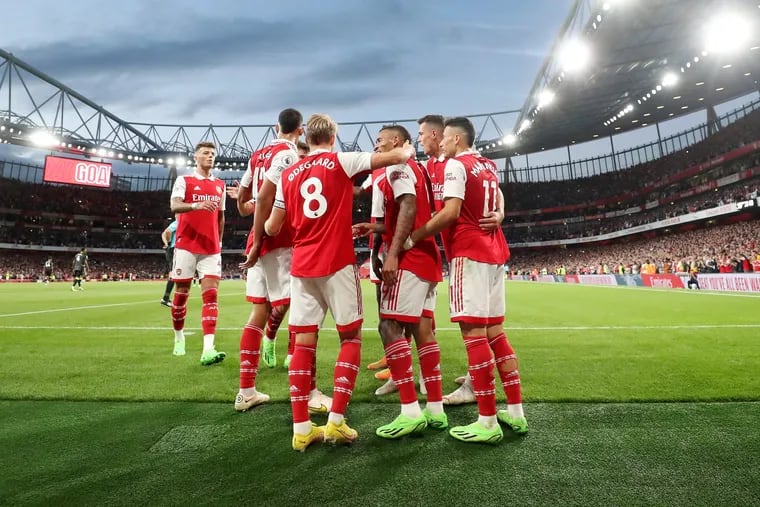 Arsenal celebrates after scoring the first goal during the Premier League match between Arsenal FC and Aston Villa at Emirates Stadium on August 31, 2022 in London, England. (Photo by Catherine Ivill/Getty Images)