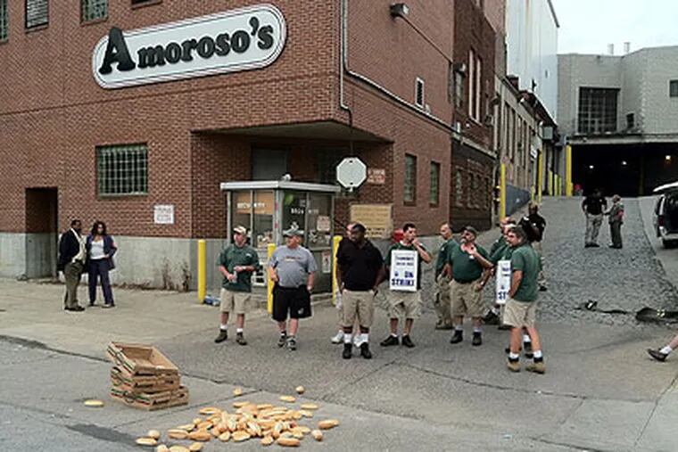 Striking unionized drivers picketed Amoroso's bakery, near South 55th Street and Baltimore Avenue in West Philadelphia, on Monday morning. Drivers will be back at work tonight, Teamsters Local 463 President Bob Ryder said.  (Clem Murray / Staff Photographer)