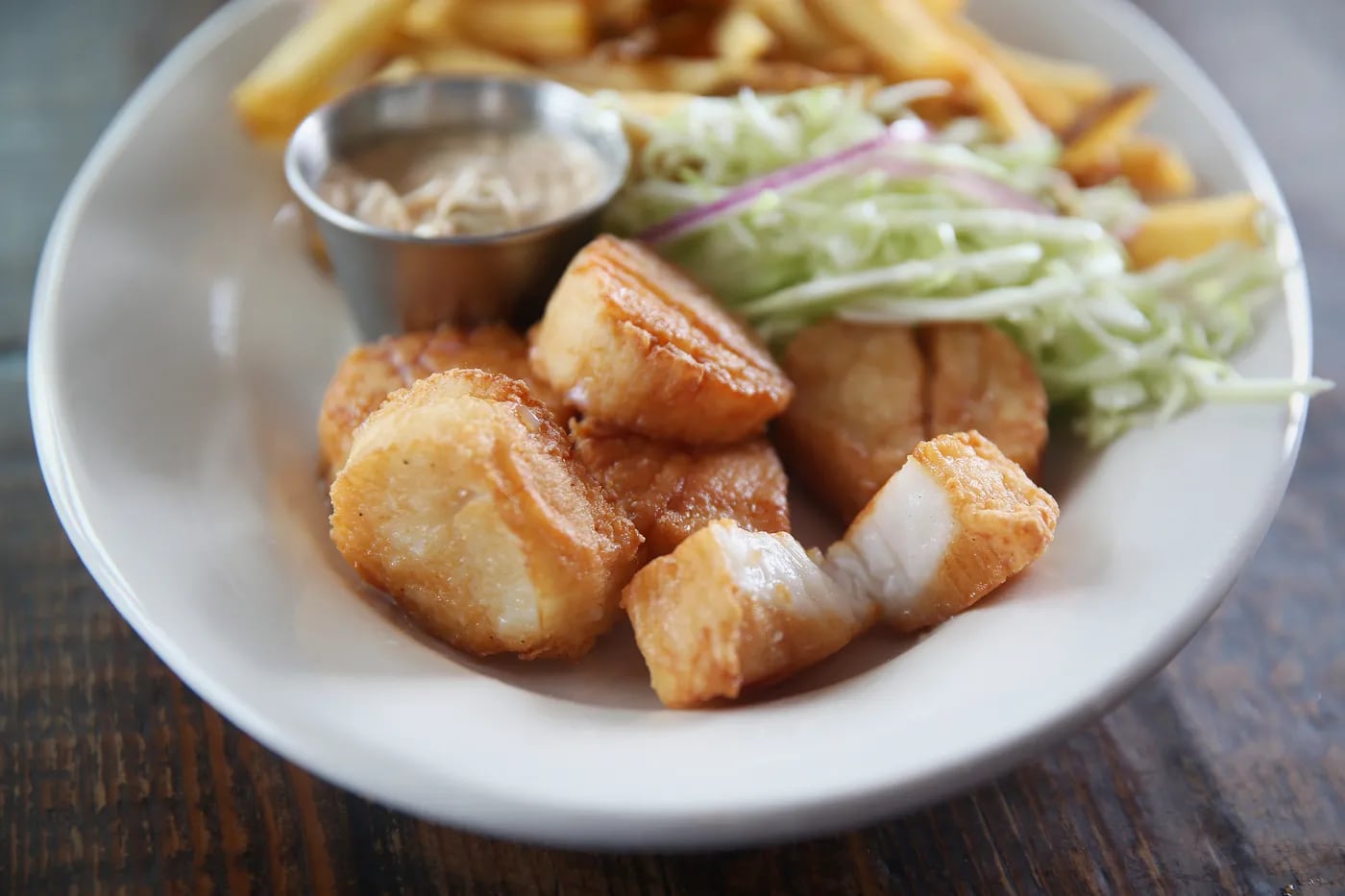 The simply fried scallops, plucked from the Lobster House’s own fishing fleet, are as delicious as ever.