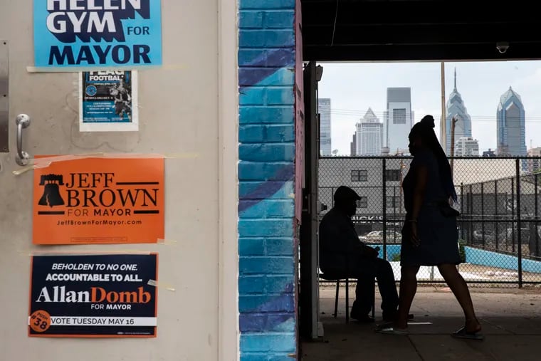 People walk into the polling place at Chew Playground on Election Day in Point Breeze.