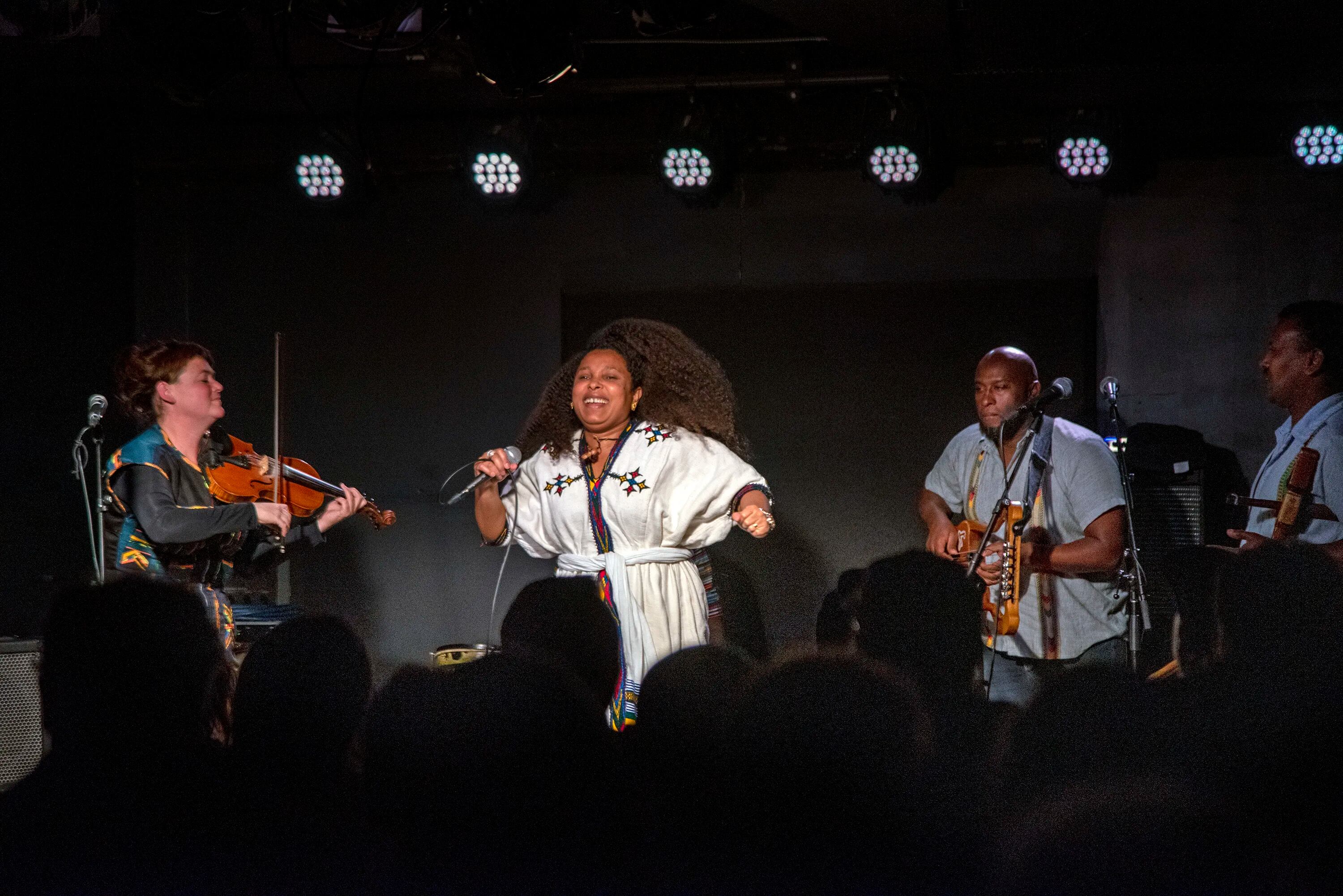 The Ethiopian band QWANQWA on stage at Solar Myth at Boot & Saddle on South Broad Street Tuesday night. Nov. 15, 2022. From left are violinist Kaethe Hostetter; vocalist Selamnesh Zemene; Bubu Teklemariam, playing the bass krar; and Endris Hassen on mesenko. Drummer Misale Legesse is not shown.