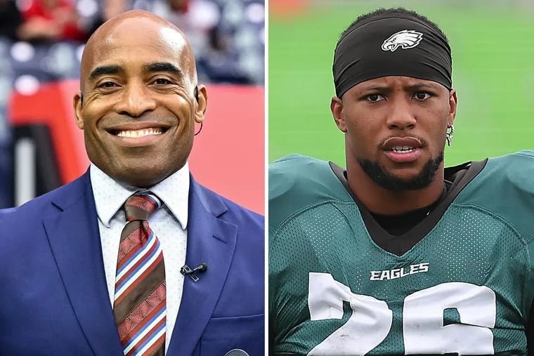 Former Giants running back Tiki Barber (left) and Eagles running back Saquon Barkley.