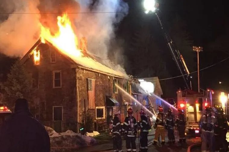 Firefighters battle blaze at the Sergeantsville Inn early Monday, March 9, 2015.