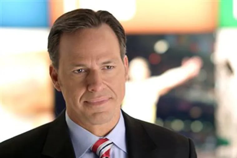 This undated image from video provided by CNN shows Jake Tapper on the set of his show "The Lead with Jake Tapper." Tapper says he wants the show to be a broad look at the news, encompassing business, politics and entertainment. (AP Photo/CNN)