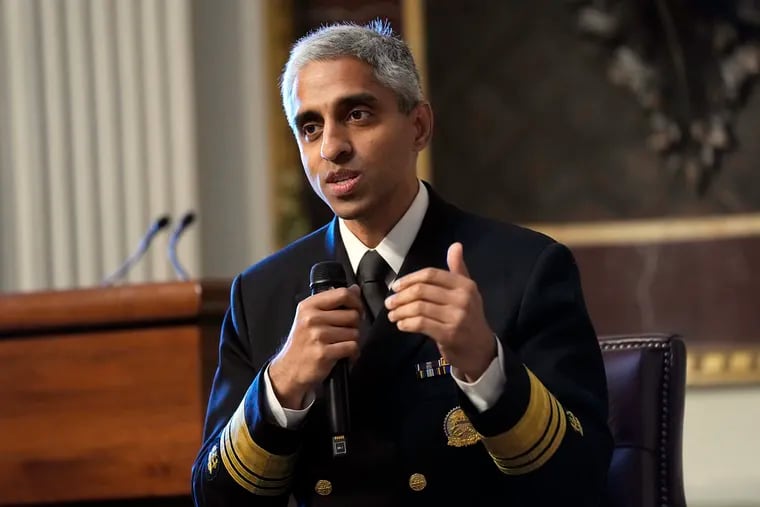 FILE - Surgeon General Dr. Vivek Murthy speaks during an event on the White House complex in Washington, April 23, 2024. Murthy is asking Congress to require warning labels on social media platforms that are similar to those that appear on cigarette boxes. (AP Photo/Susan Walsh, File)