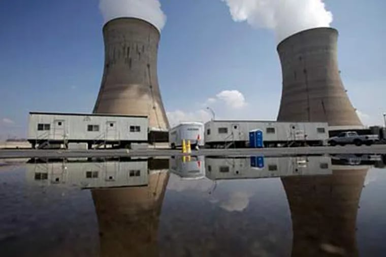 This March 17, 2009 file photo shows the cooling towers of Three Mile Island's Unit 1 plant in Middletown, Pa. A small amount of radiation was detected in a reactor building at the plant on Saturday afternoon. (AP Photo/Carolyn Kaster)