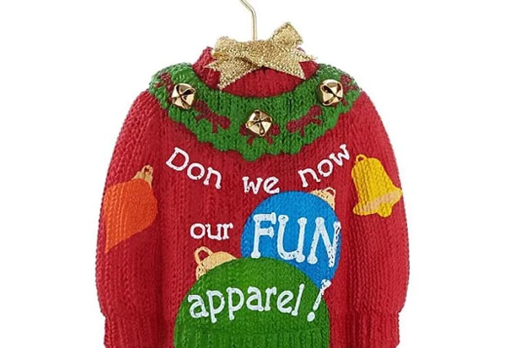 The controversial "gay"-less ugly sweater. (Photo from Hallmark and Amazon.com)