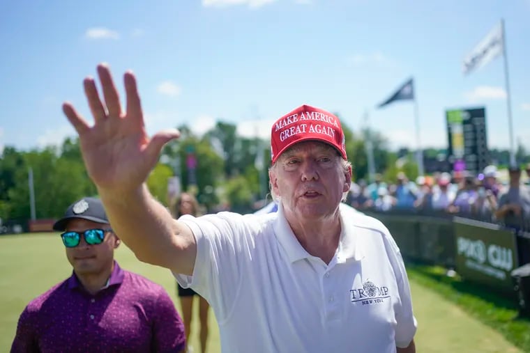 Former President Donald Trump greets supporters and sign autographs during the final round of the Bedminster Invitational LIV Golf tournament at his golf course in Bedminster, N.J., Aug. 13, 2023. The New Jersey Attorney General’s Office has declined to renew liquor licenses at two of Trump's golf clubs in the state.