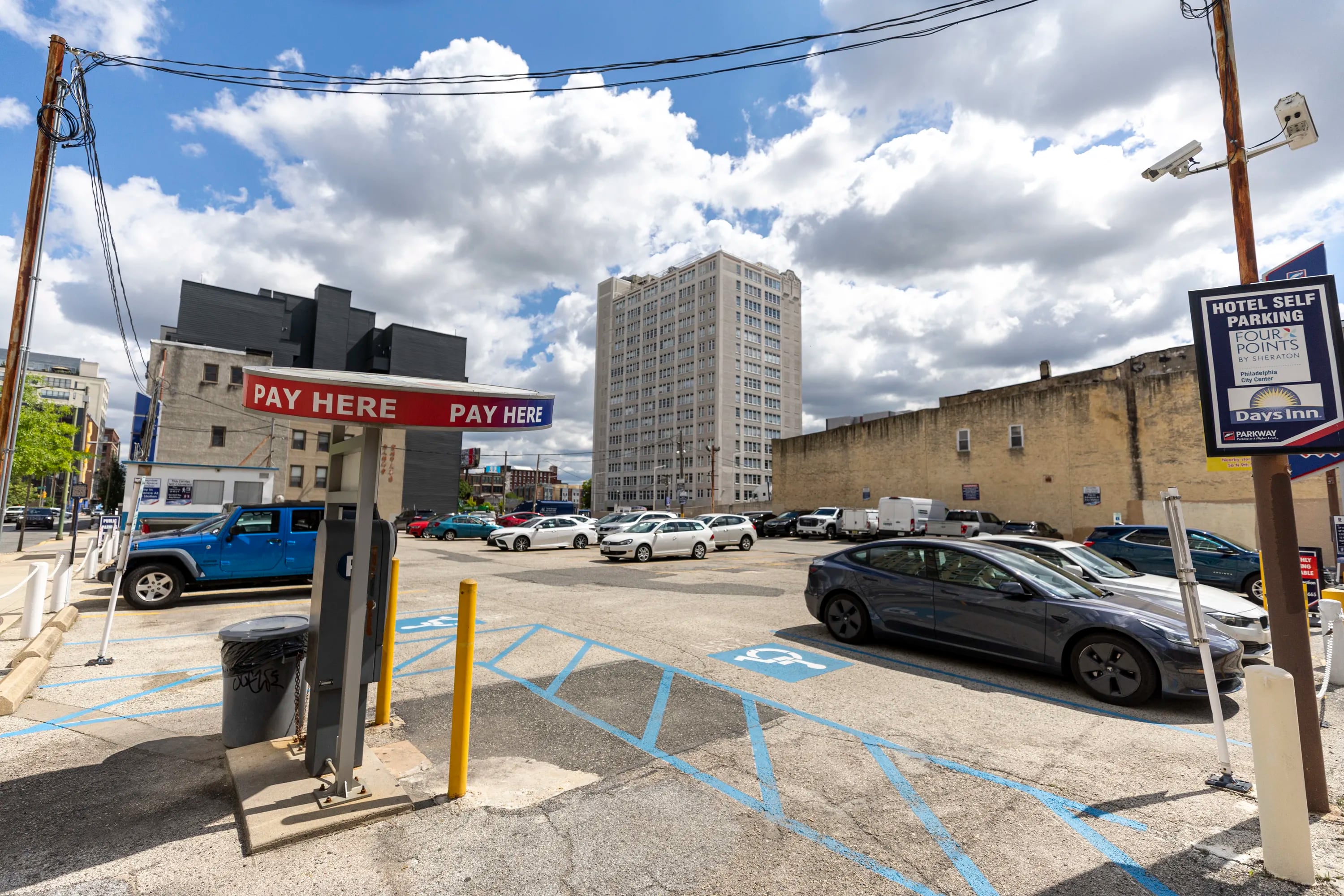 Because the large surface lot owned by Parkway Corp. at 12th and Race Streets is close to highway ramps, intercity buses could minimize the amount of time they spend traveling on city streets.